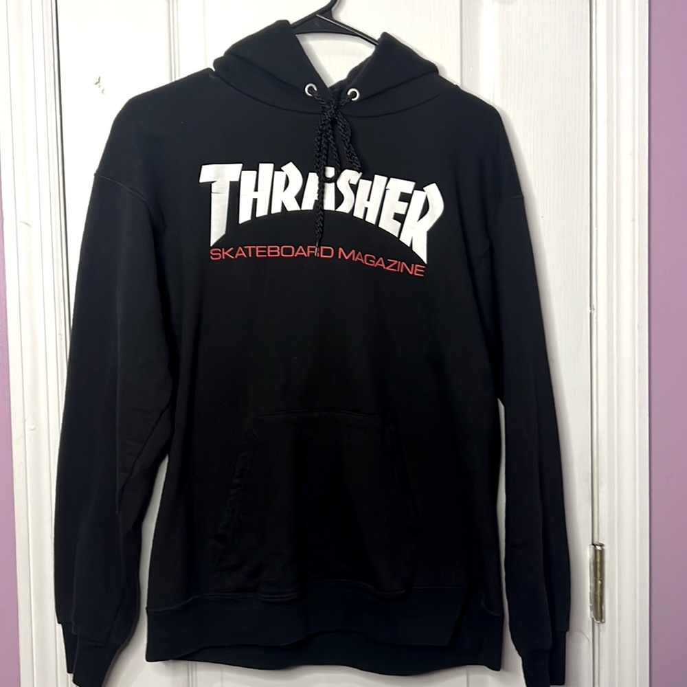 Men’s small (34-36) black thrasher hoodie good condition only worn 2 times.